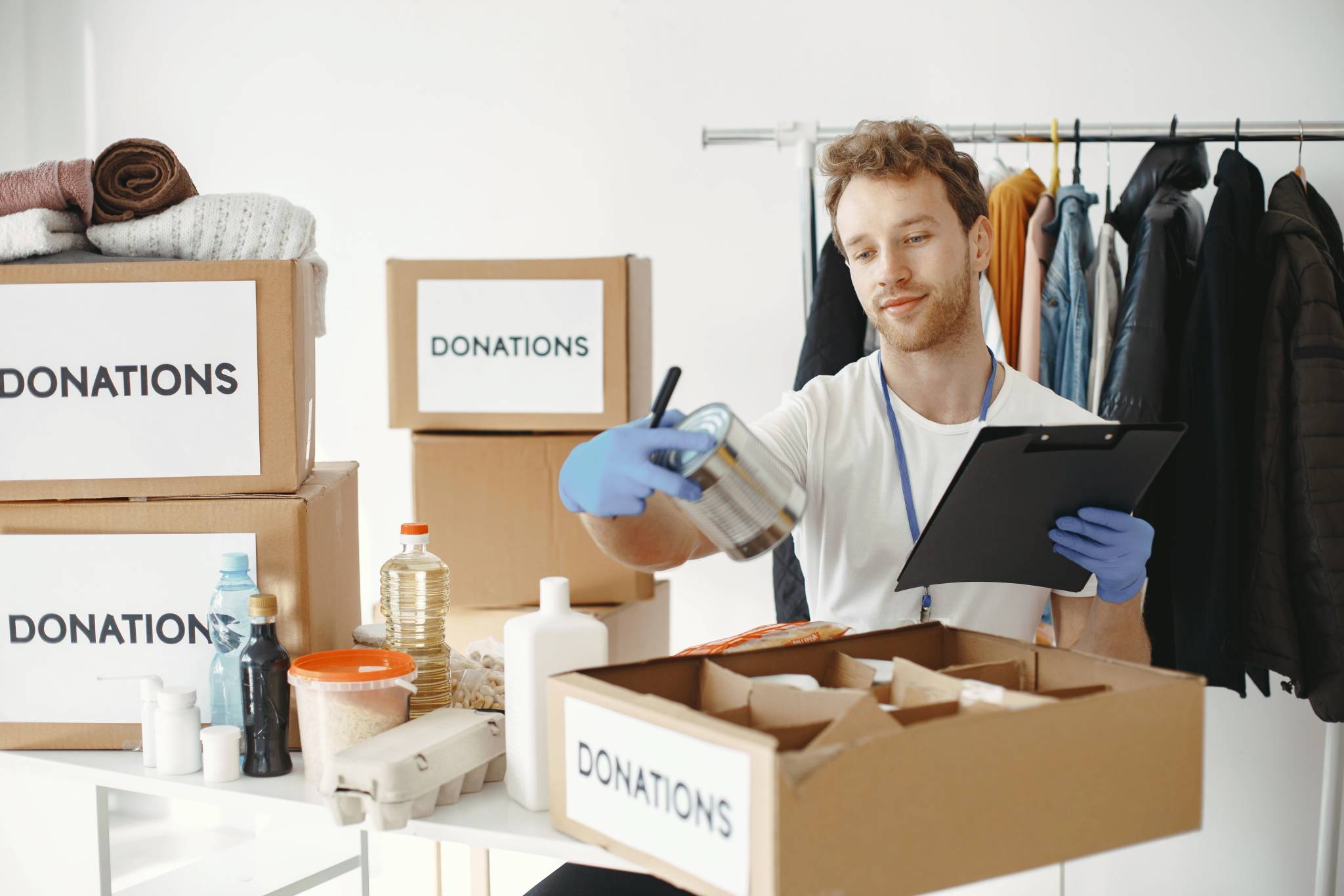 Guy collecting items that has been donated