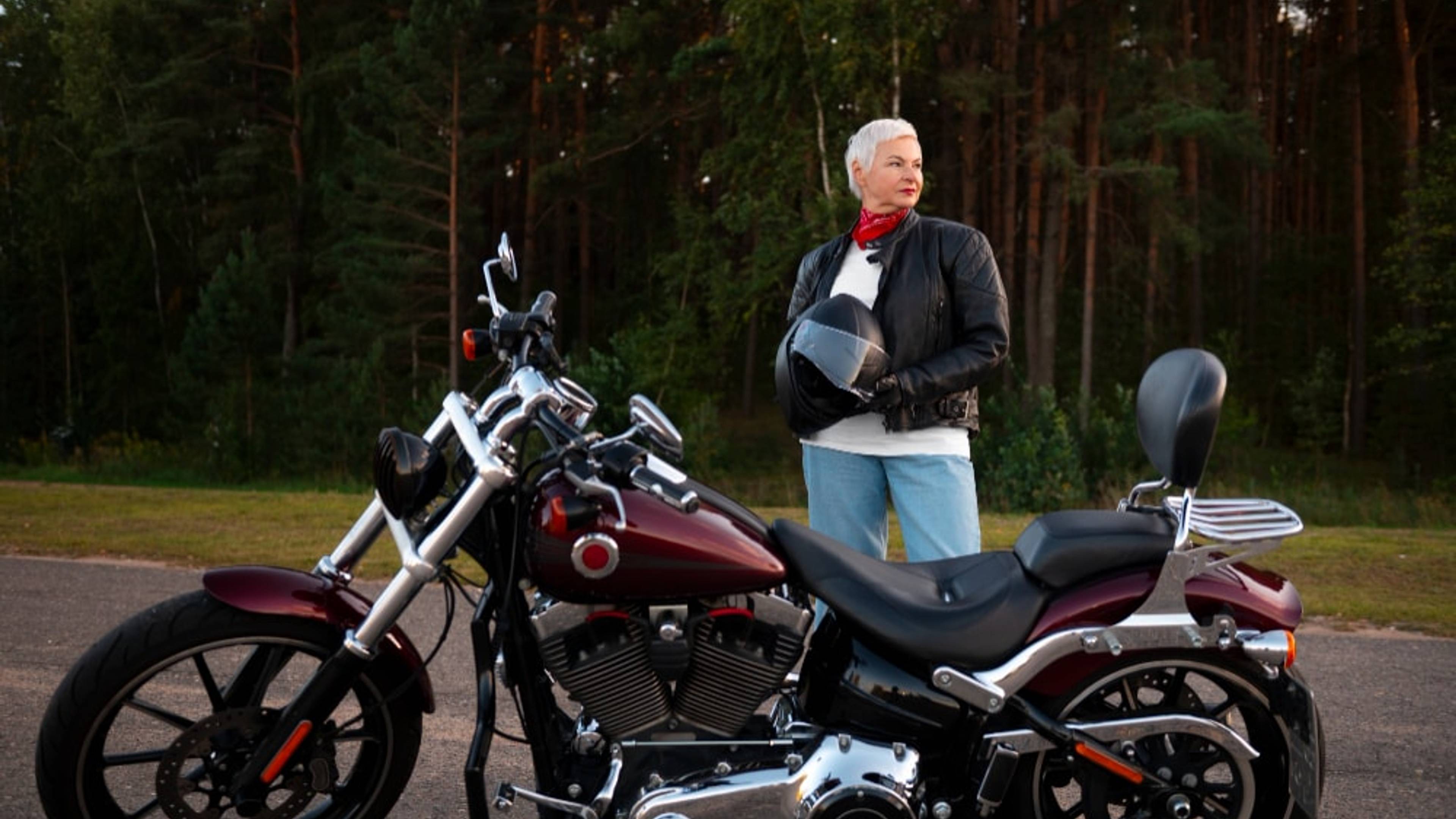 Woman motorcyclist with Motorbike