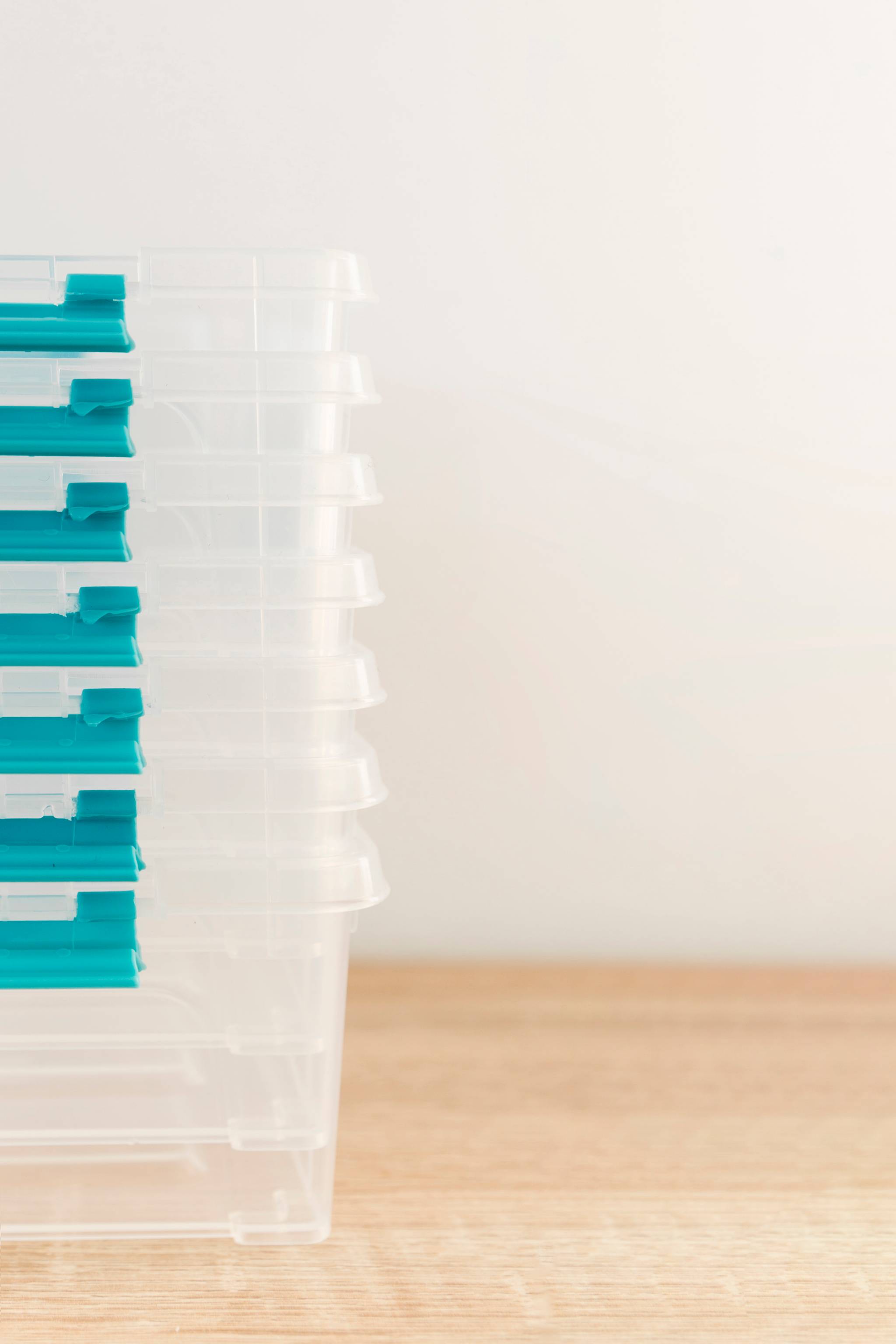Stack of clear plastic bins