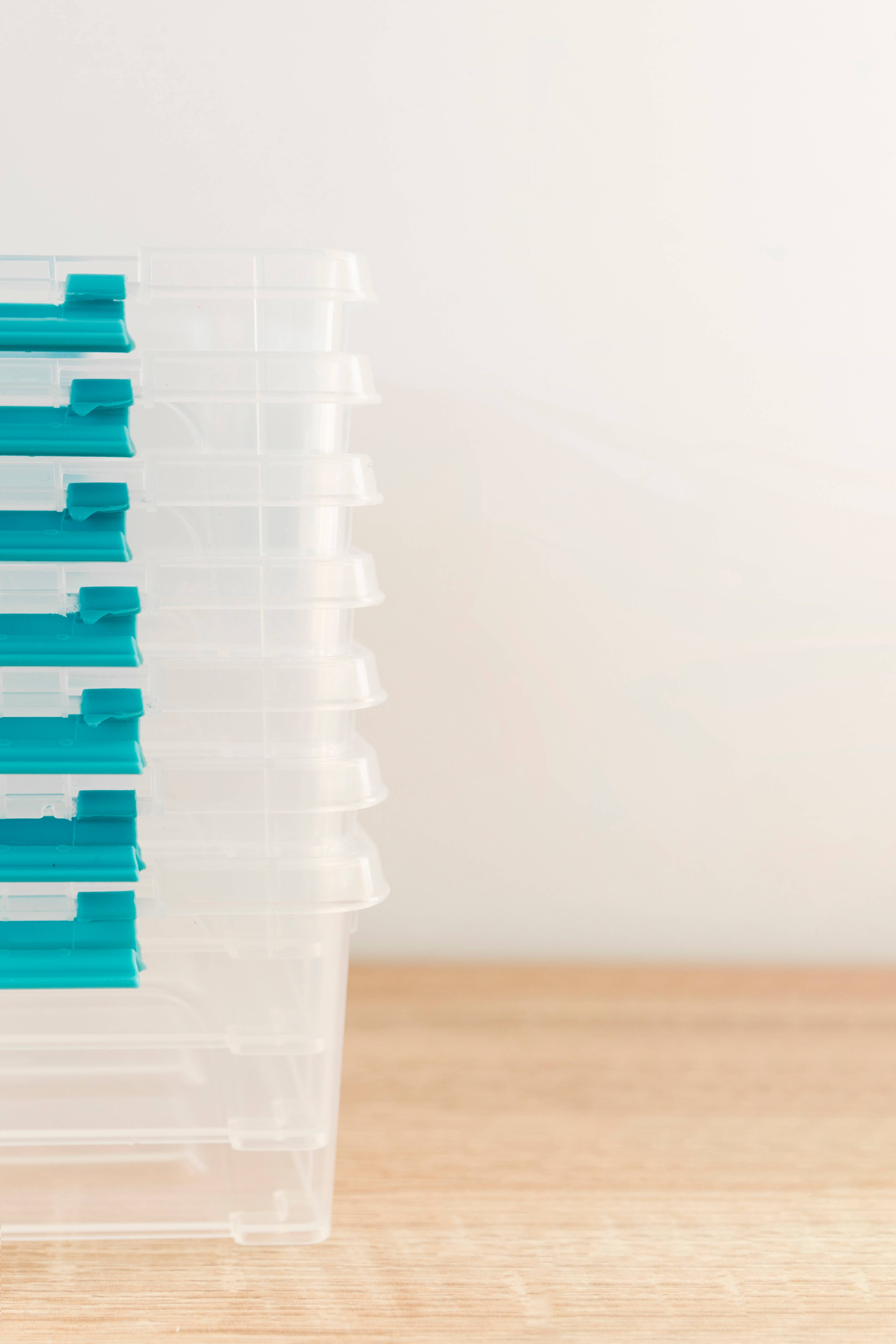 Stack of clear plastic bins