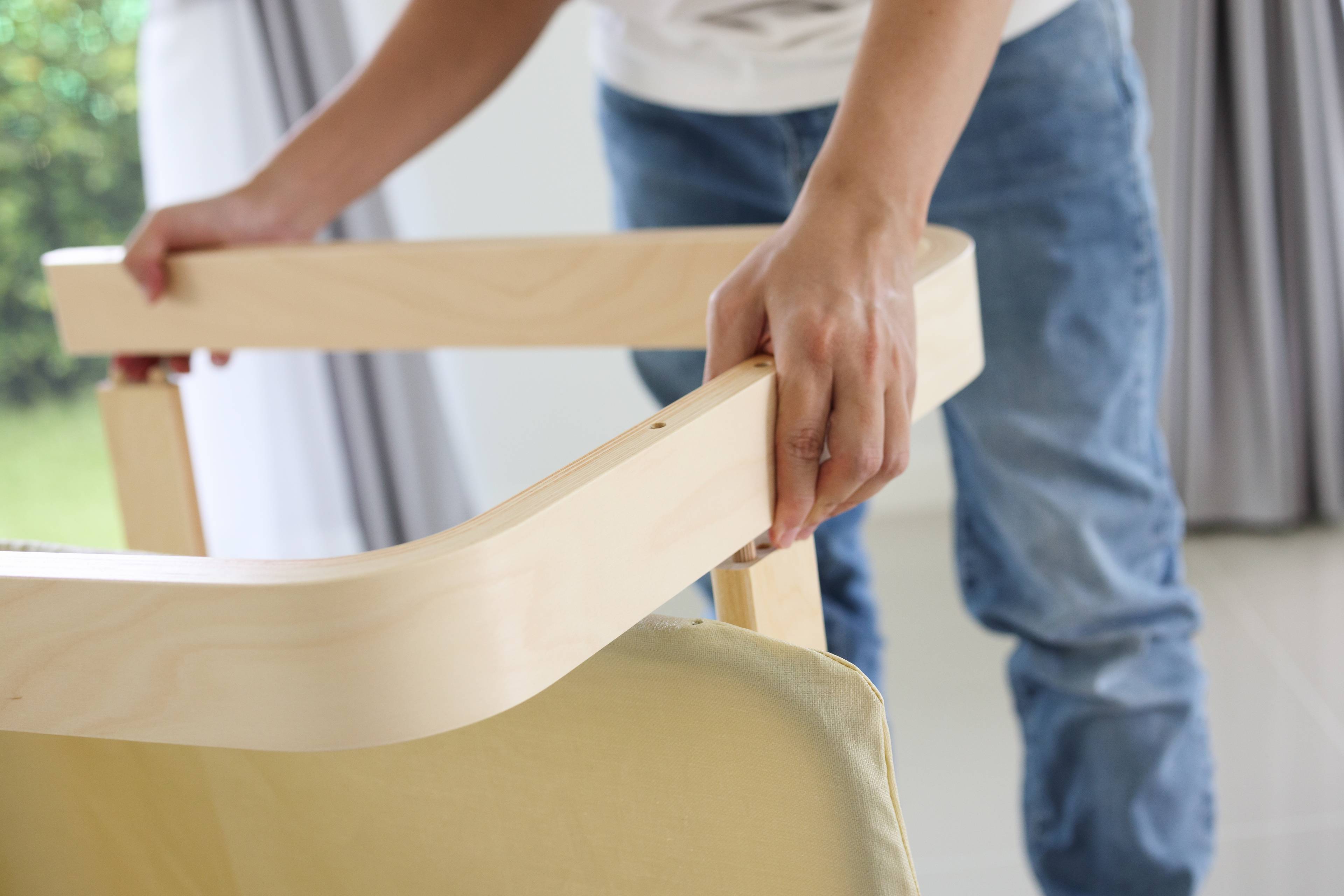 Man's hands on chair