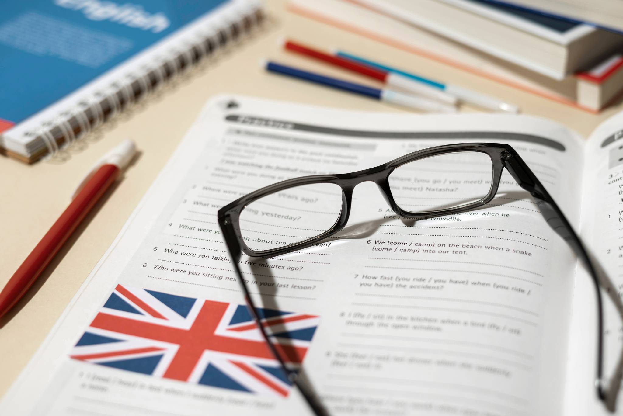 Glasses on document showing union jack