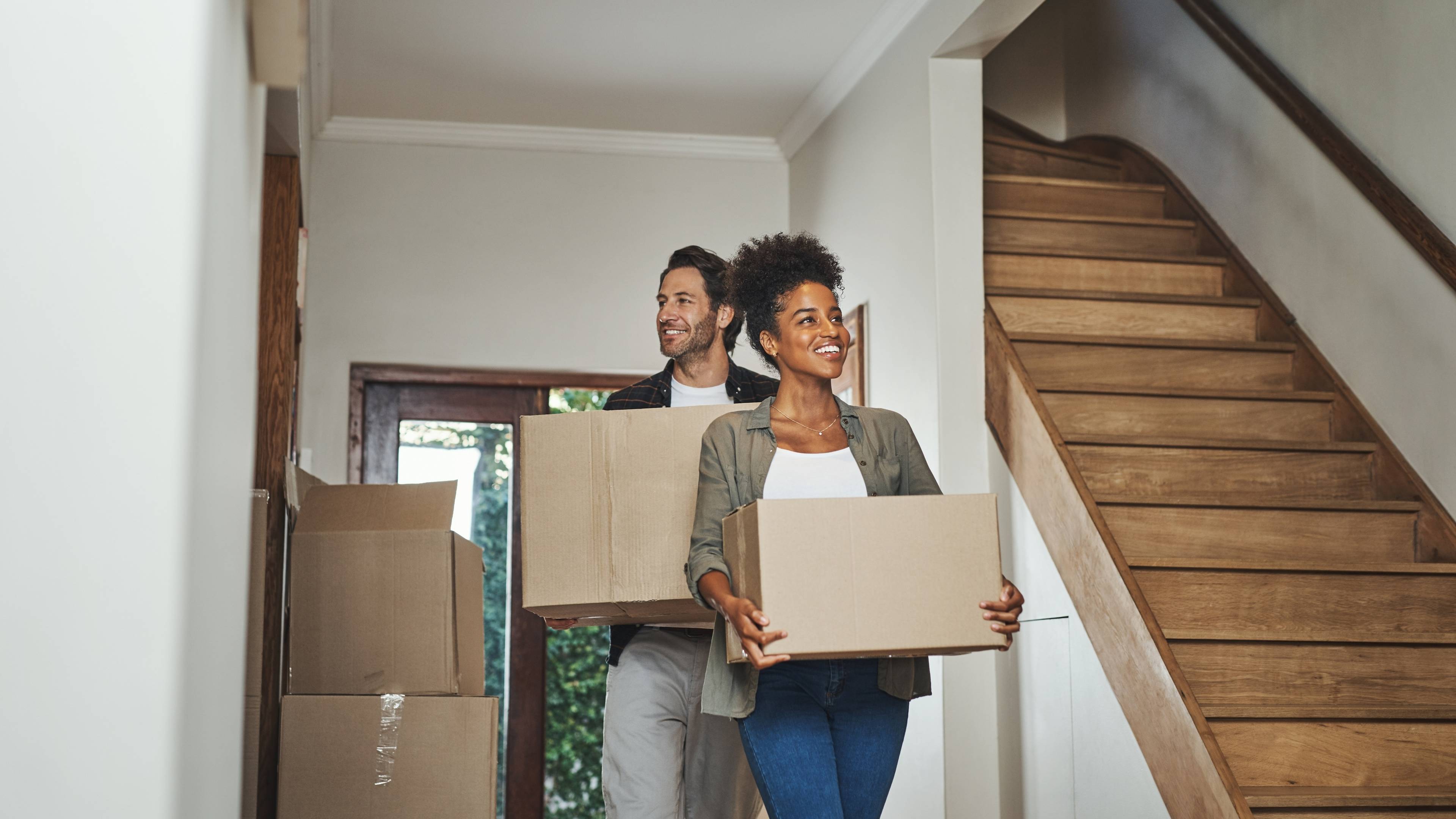 Young couple moving into new house together