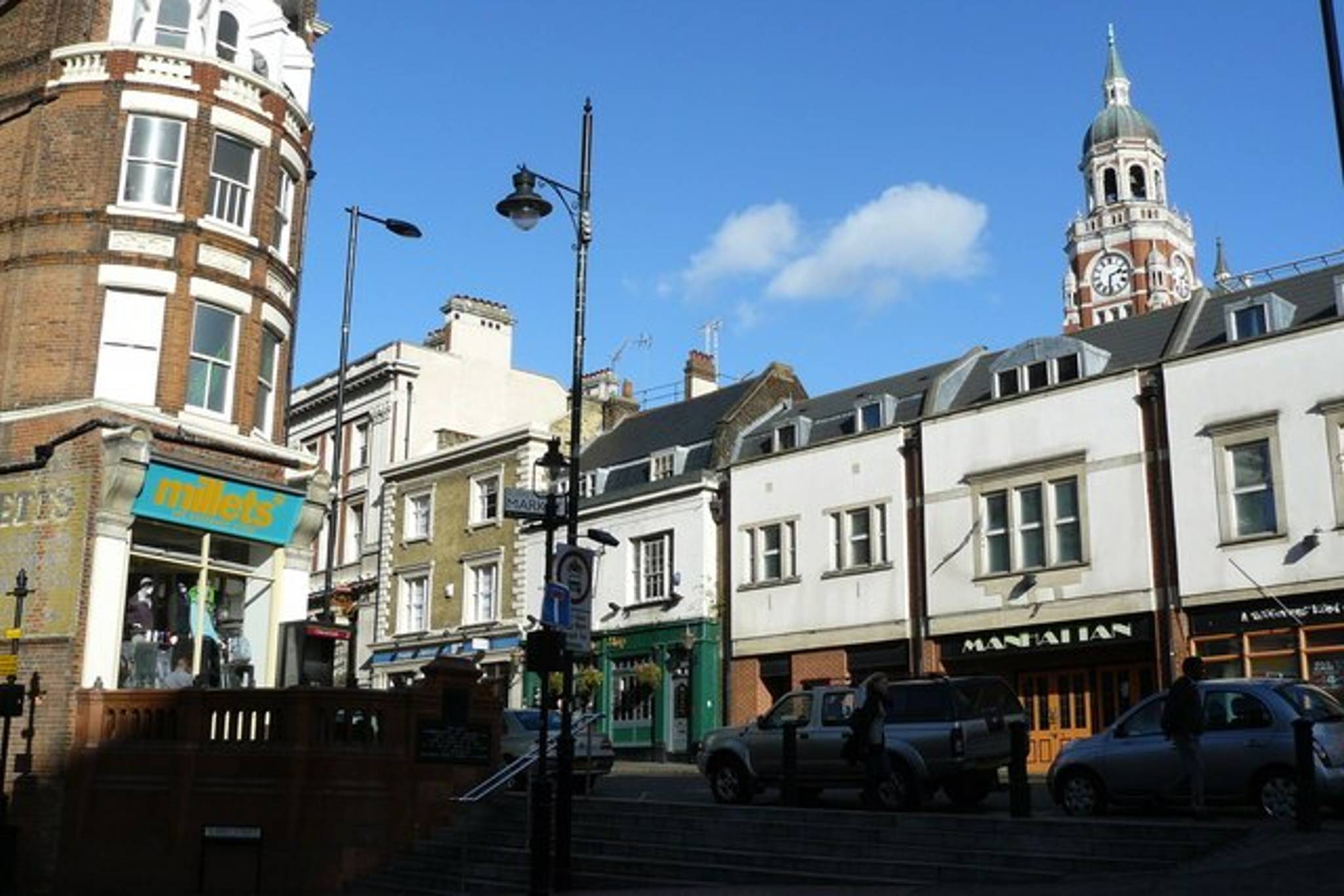 High Street, Croydon Photograph taken from the top end of Surrey Street. To the left of picture is Millets, a late Victorian building. In the centre of picture is The Ship, one of the oldest pubs in Croydon. The buildings to the right of picture were constructed, in the 1990's, to a design in keeping with the older buildings. On the skyline, is the clocktower from Croydon's Town Hall.