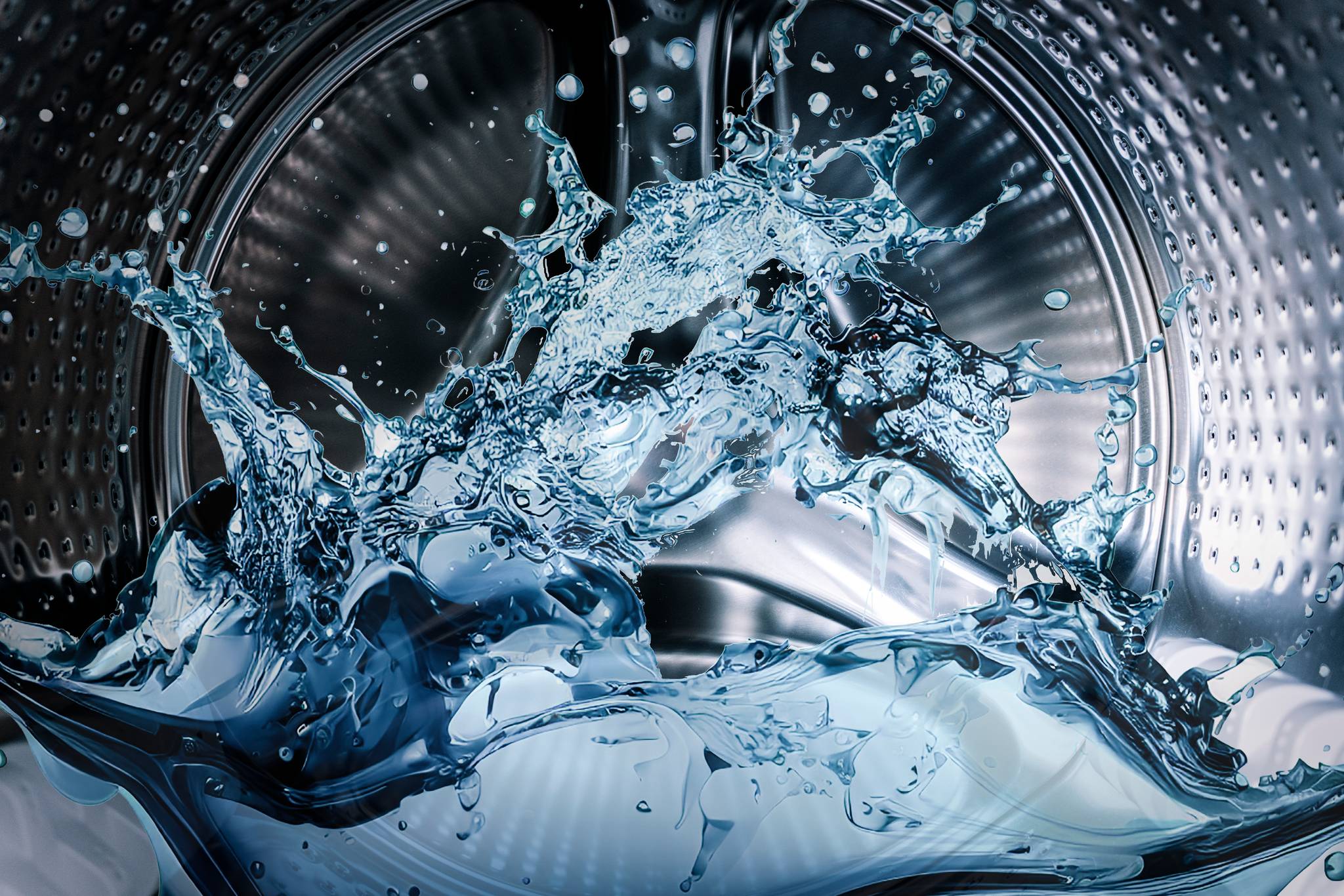 Washing machine drum with clean water flow and splashes Laundry washing powder concept