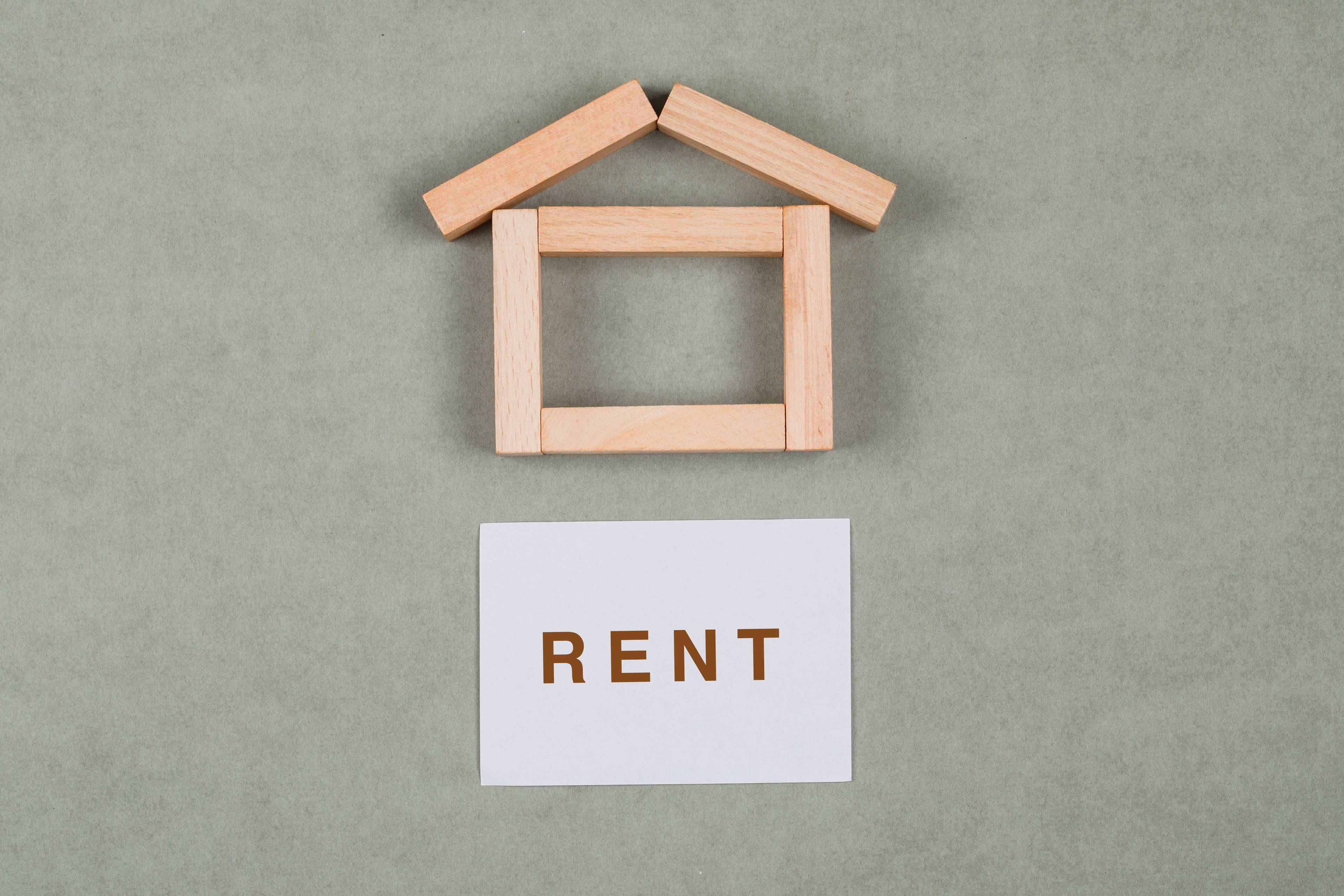 Renting a house concept using wooden blocks