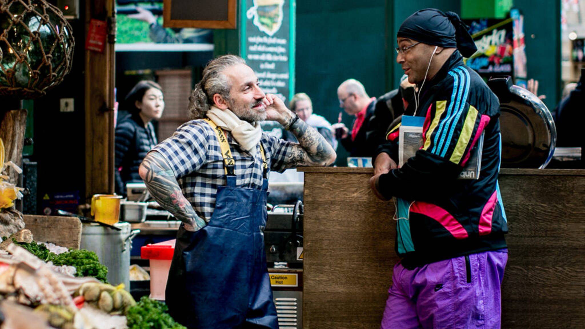 traders speaking to each other at borough market