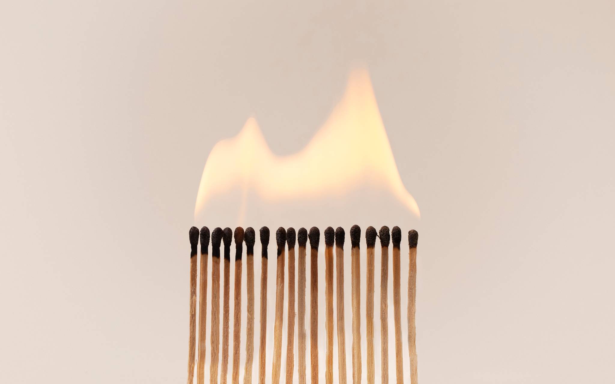 Arrangement of burning matches