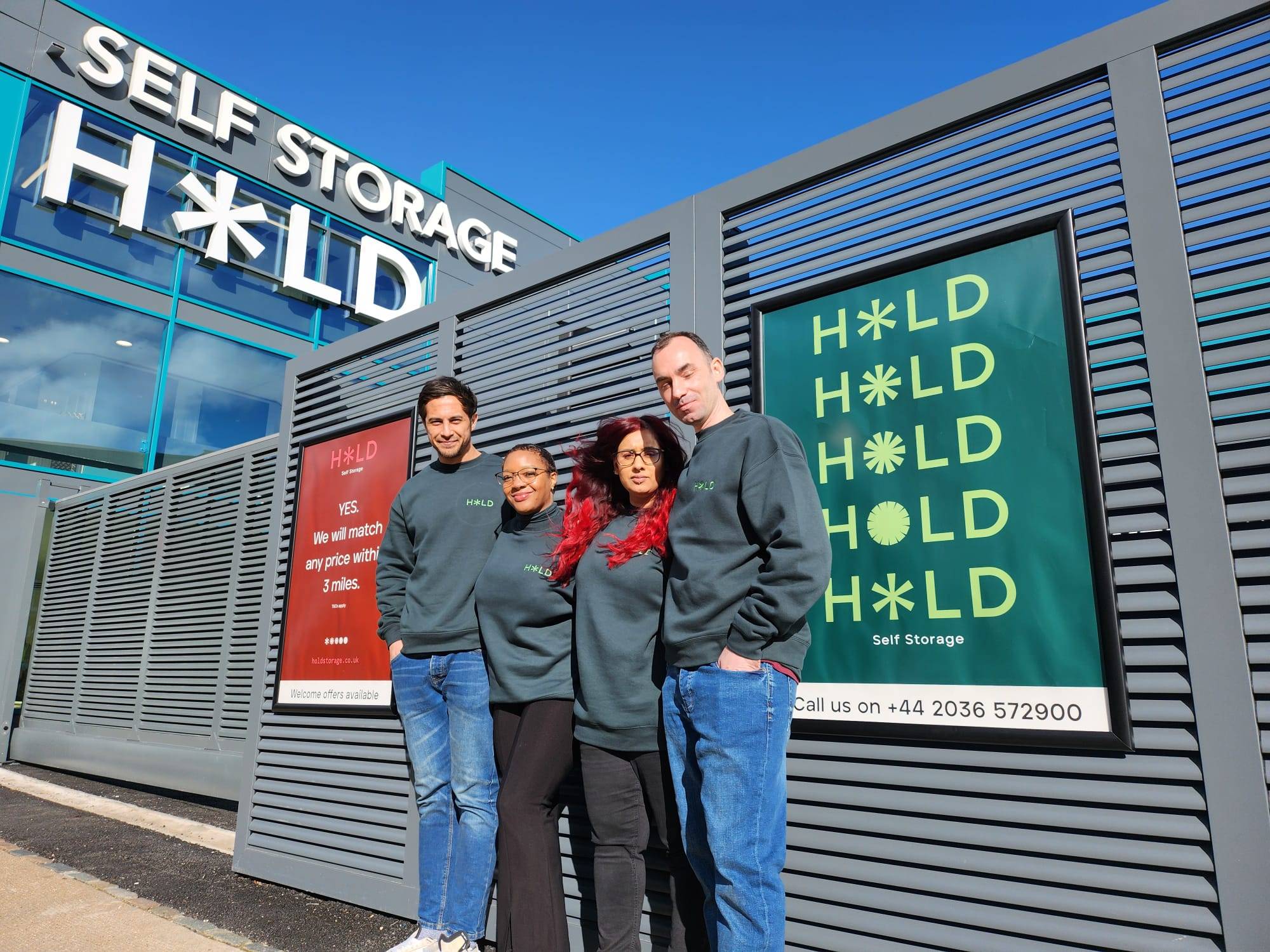 HOLD Self storage staff outside facility