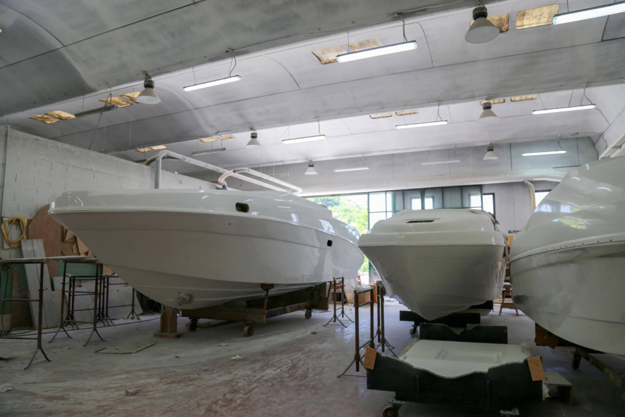 Boats being stored inside a large garage