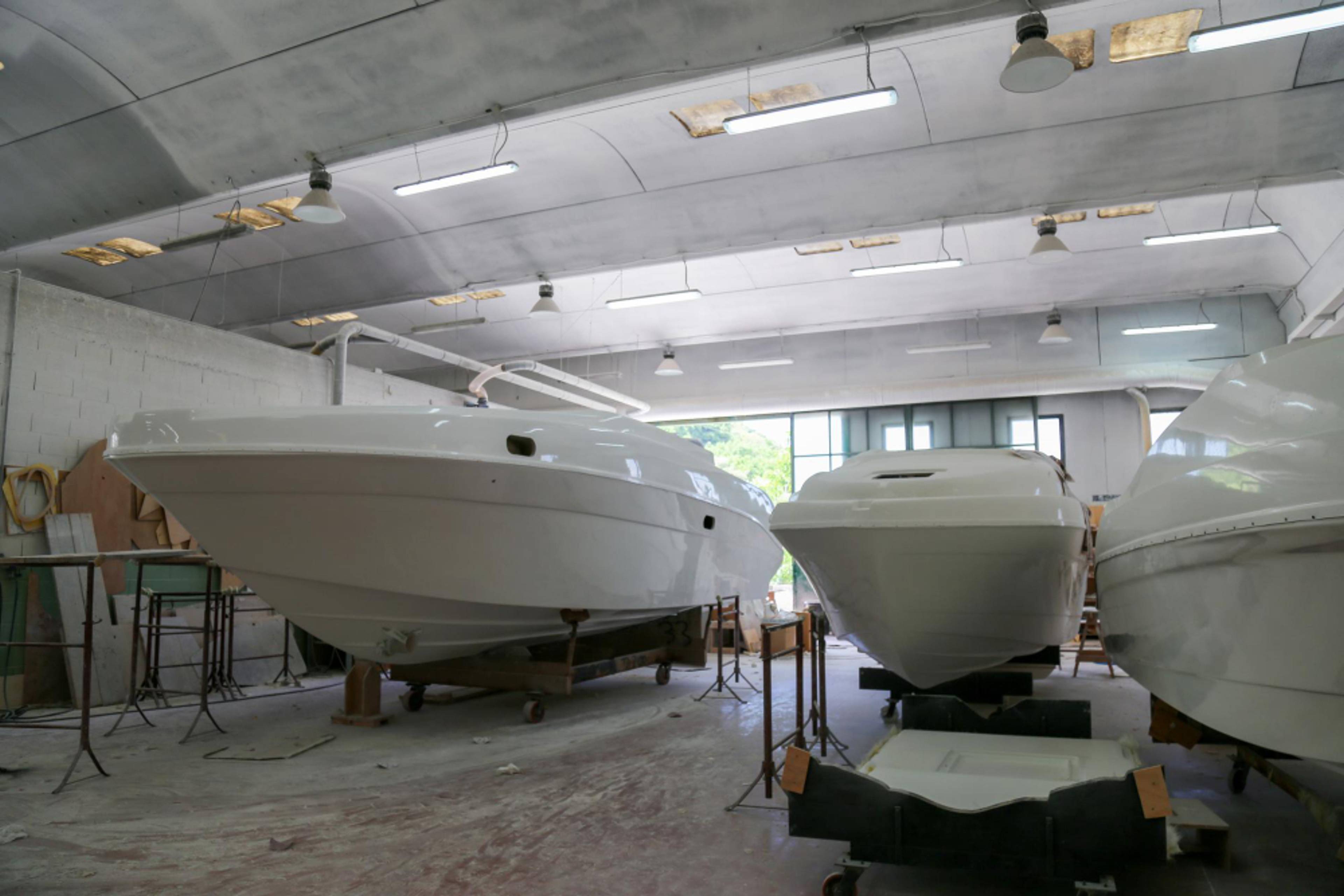 Boats being stored inside a large garage