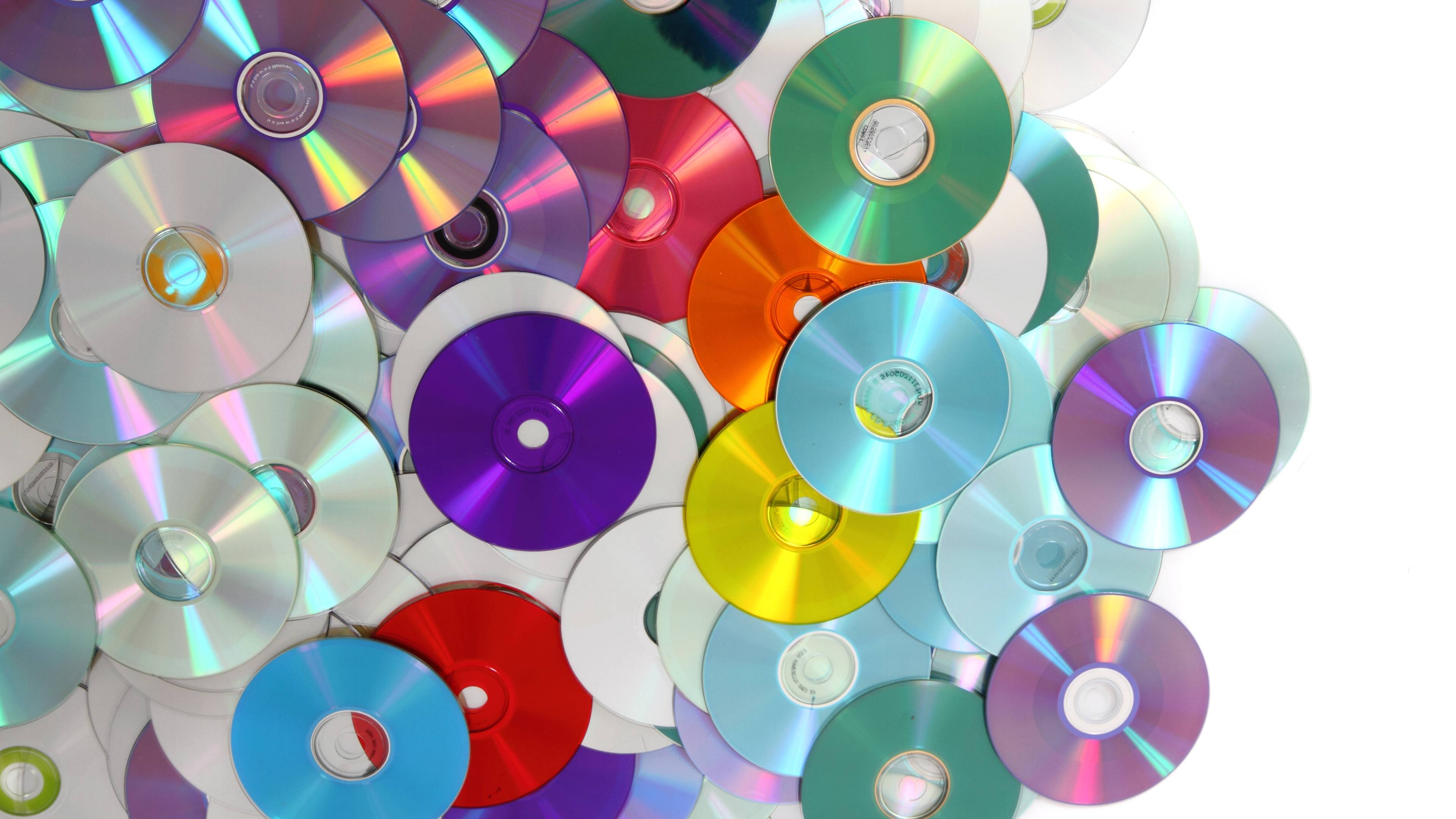 Close-up of multi colored pencils over white background