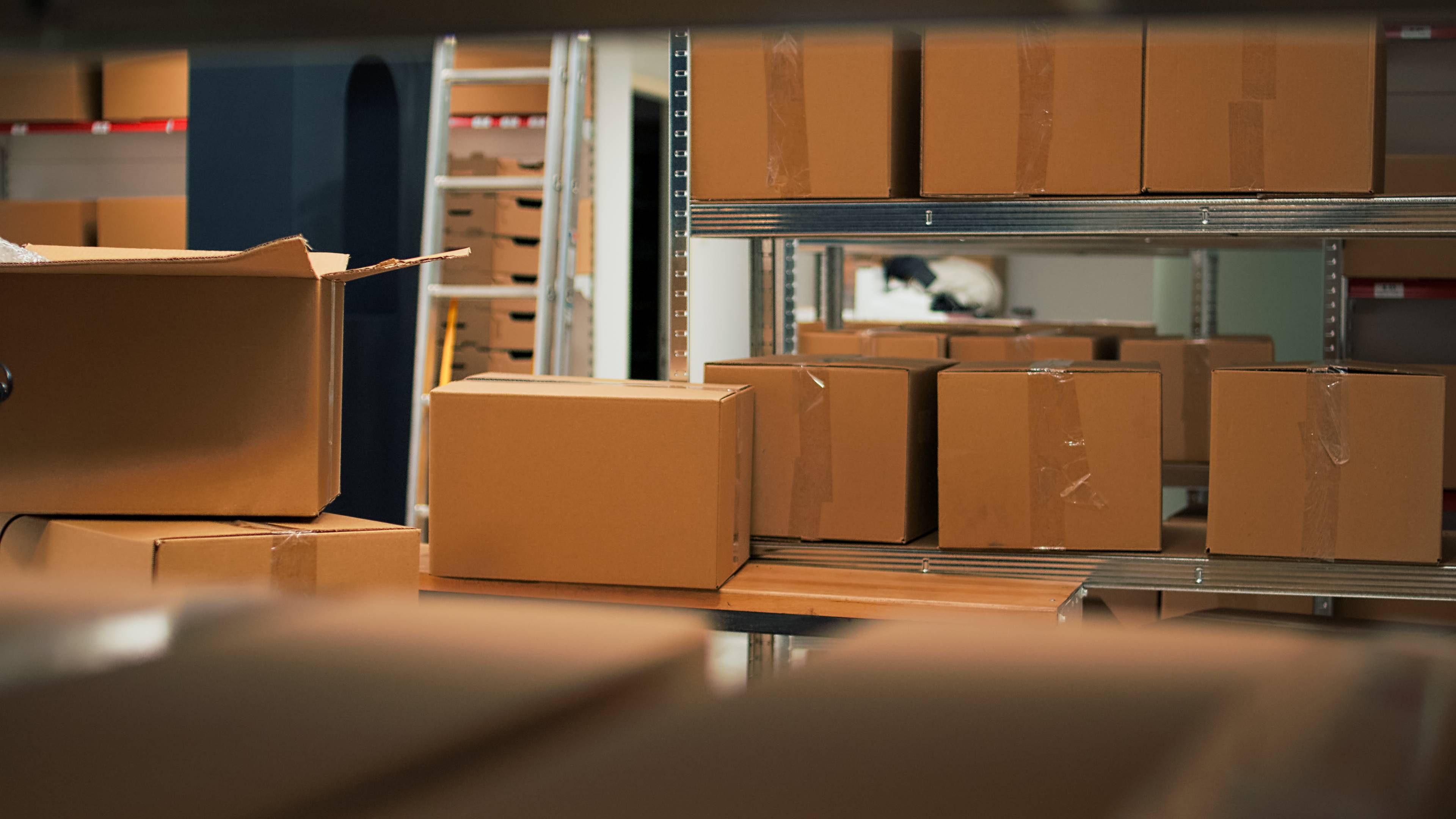 storage unit with shelving and boxes