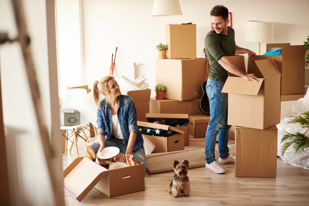 couple packing for moving home