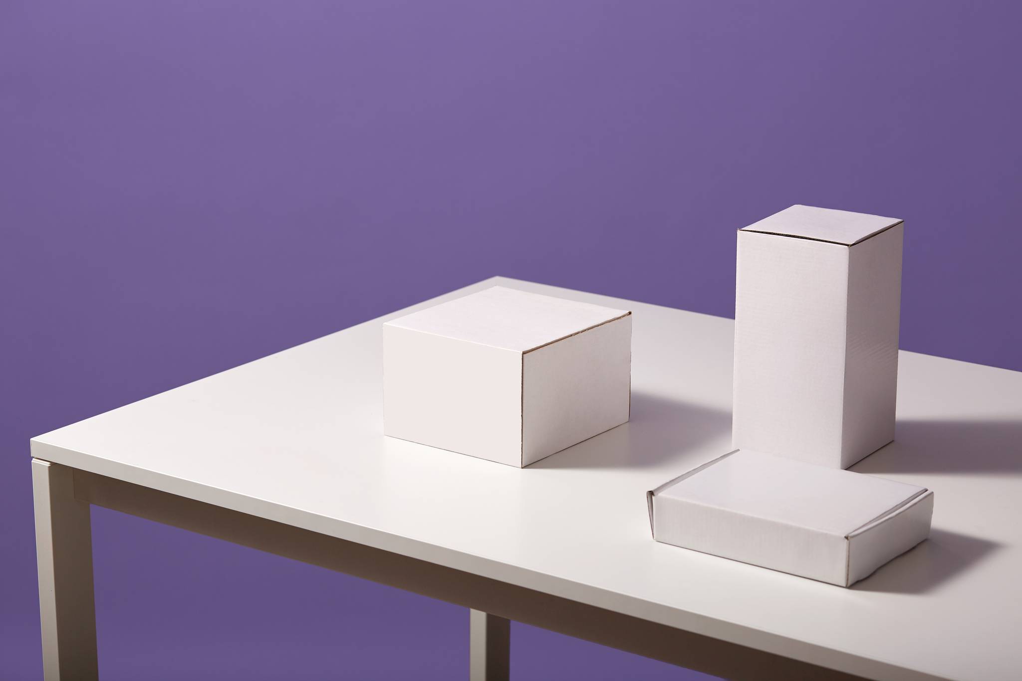 Three blocks with different sizes on a white table