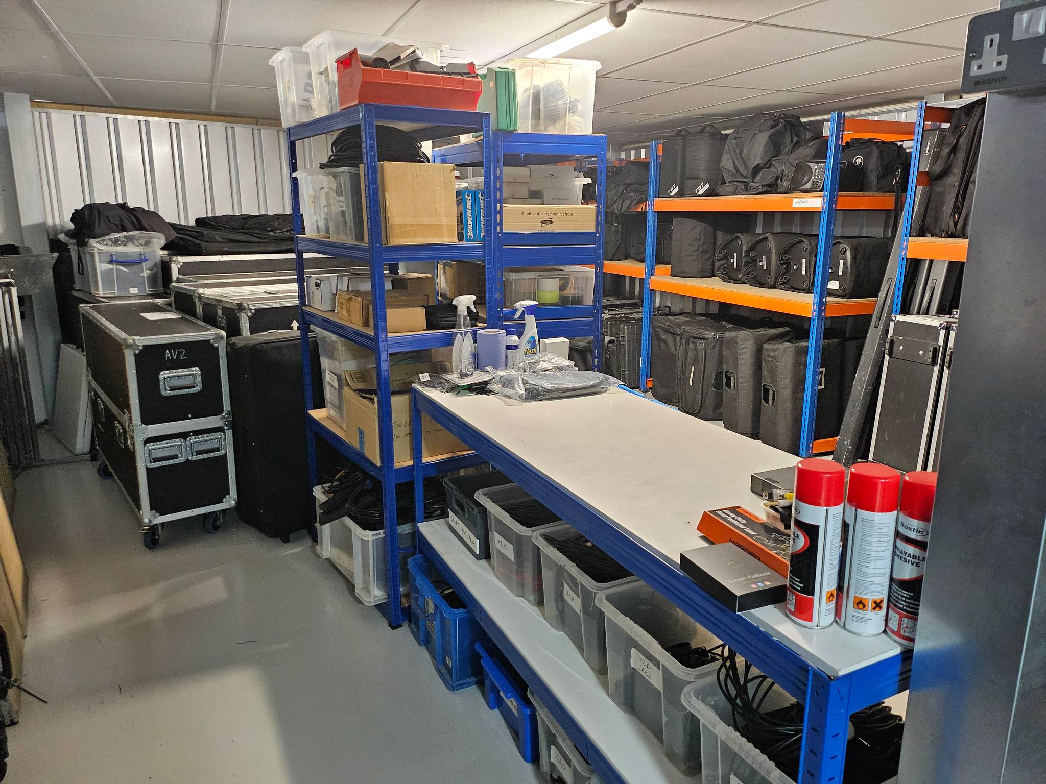 hold self storage storage unit with trade stock stacked neatly