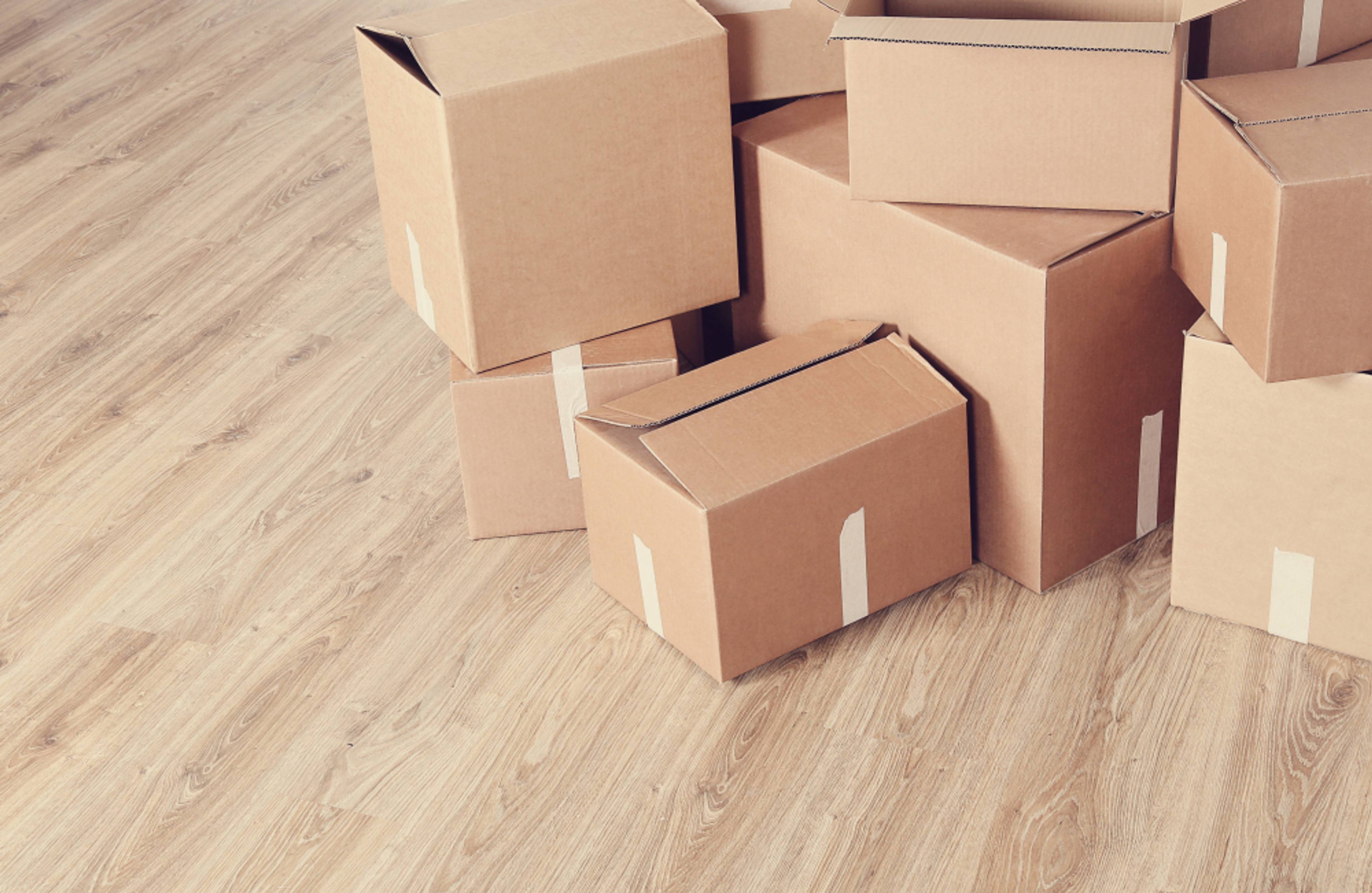 Empty boxes on a wooden floor