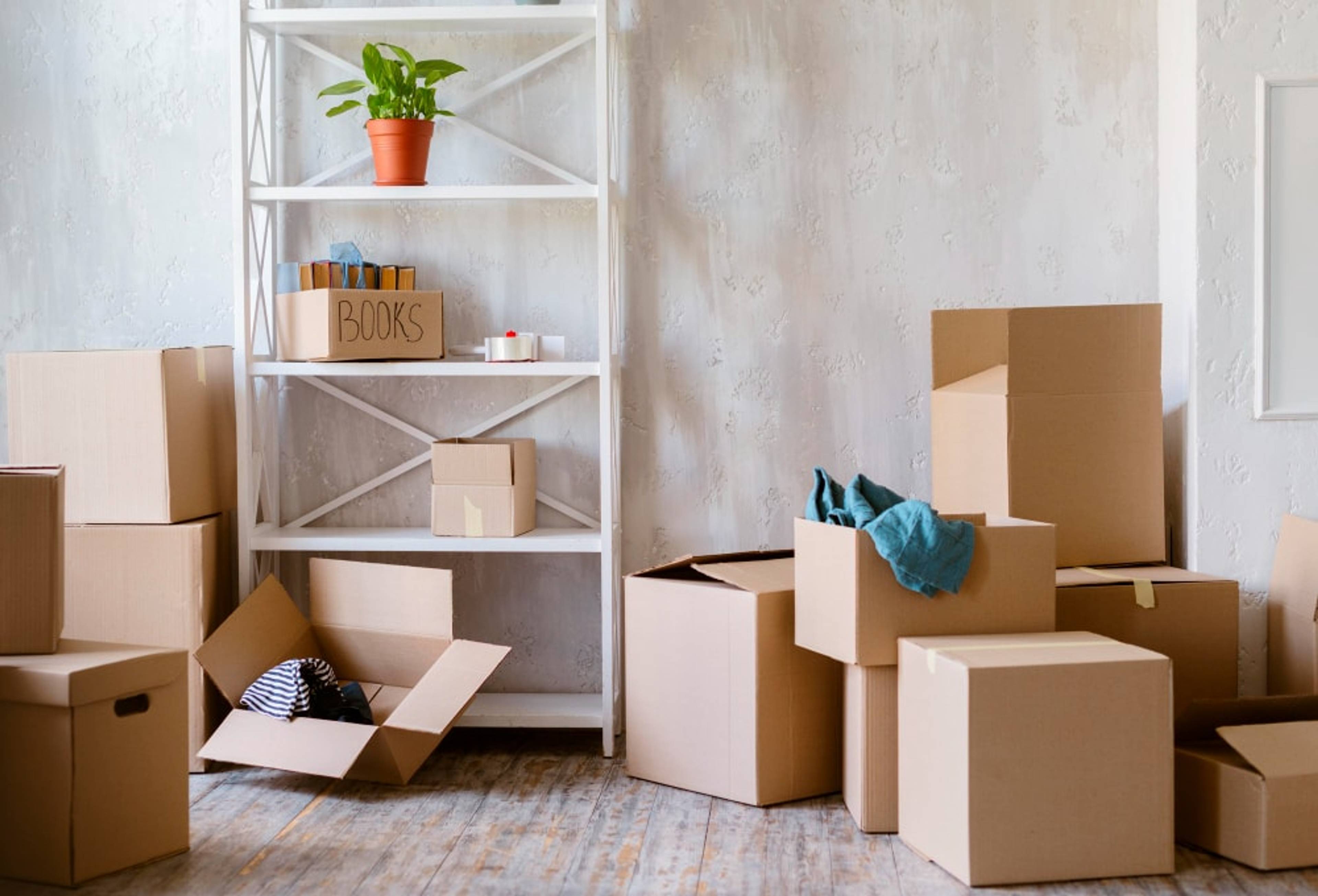 A room filled with boxes being packed to go into storage