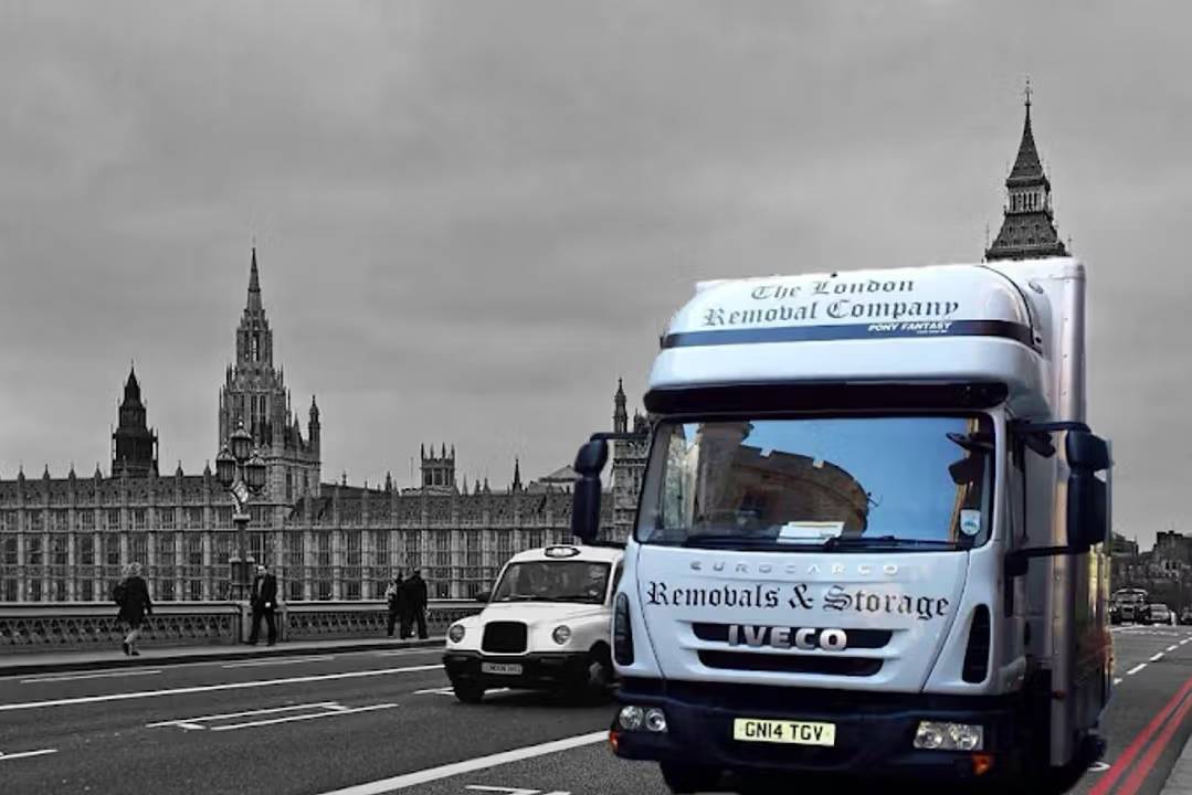 london removals company lorry houses of parliament background