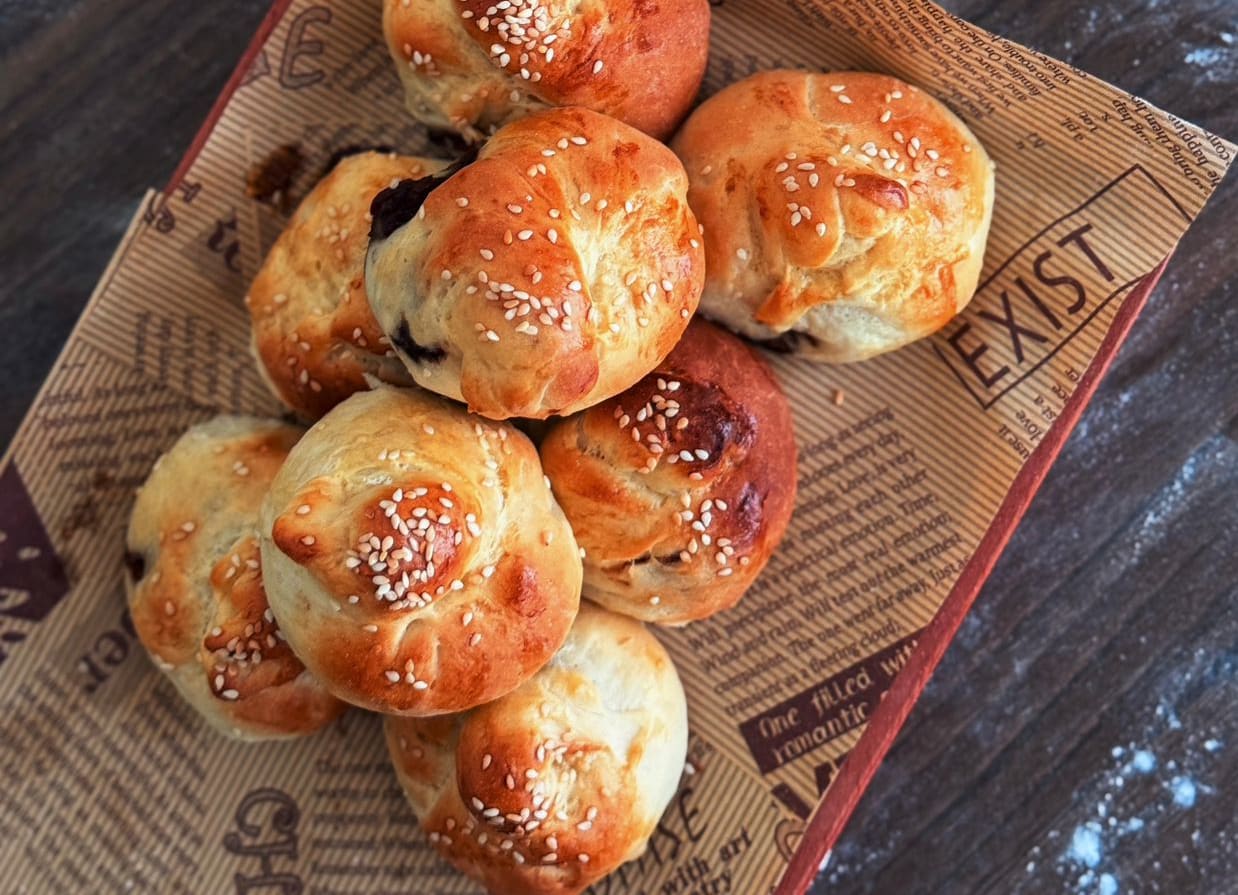 Filipino-style bread rolls filled with braised chicken.