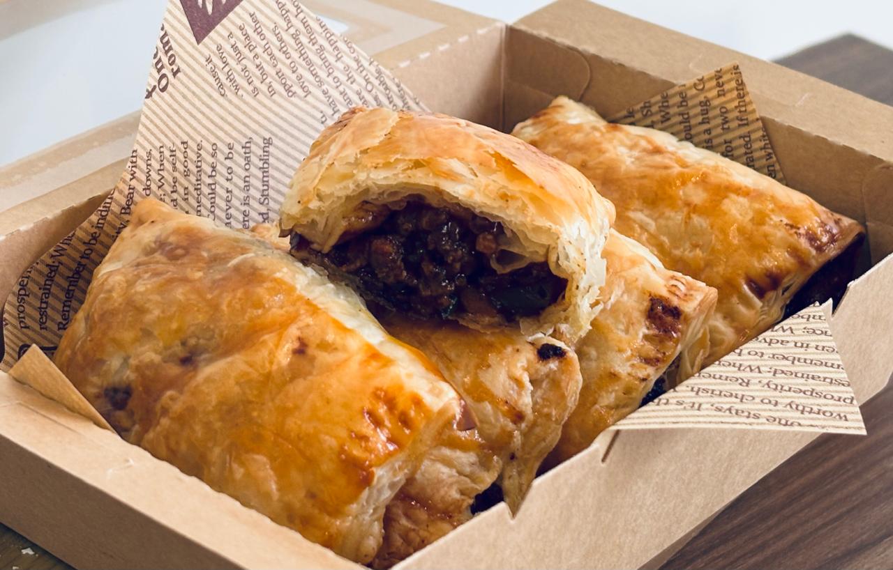 Flaky beef empanadas with savory beef and vegetable filling.