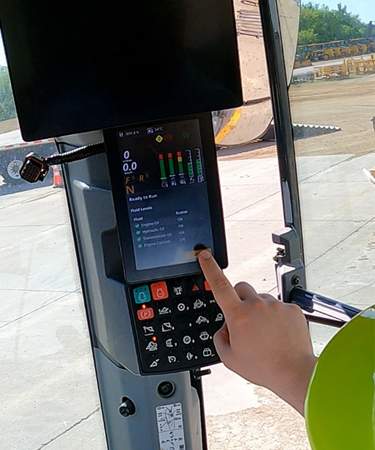 This customer is checking their machine health through the in-cab display