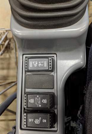 Coupler control switch on left side pilot tower