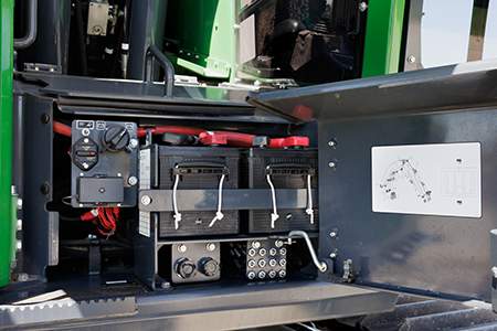 A grease bank is located near the battery disconnect, to easily service the boom joints 