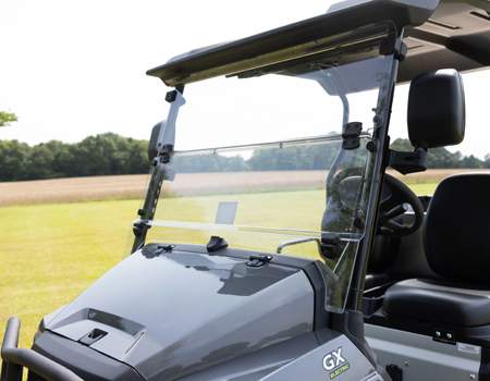 Hinged windshield in raised position