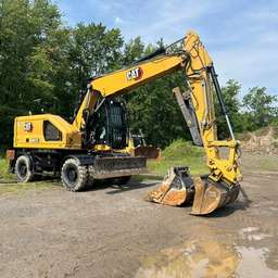 What is a telehandler telescopic handler lifting a pallet on a construction site