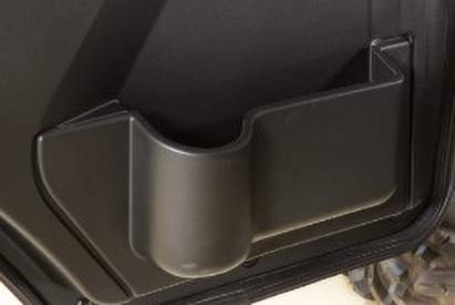 Cab door cup holder and pocket