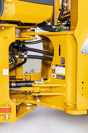 View of improved hydraulic routing at the loader articulation joint
