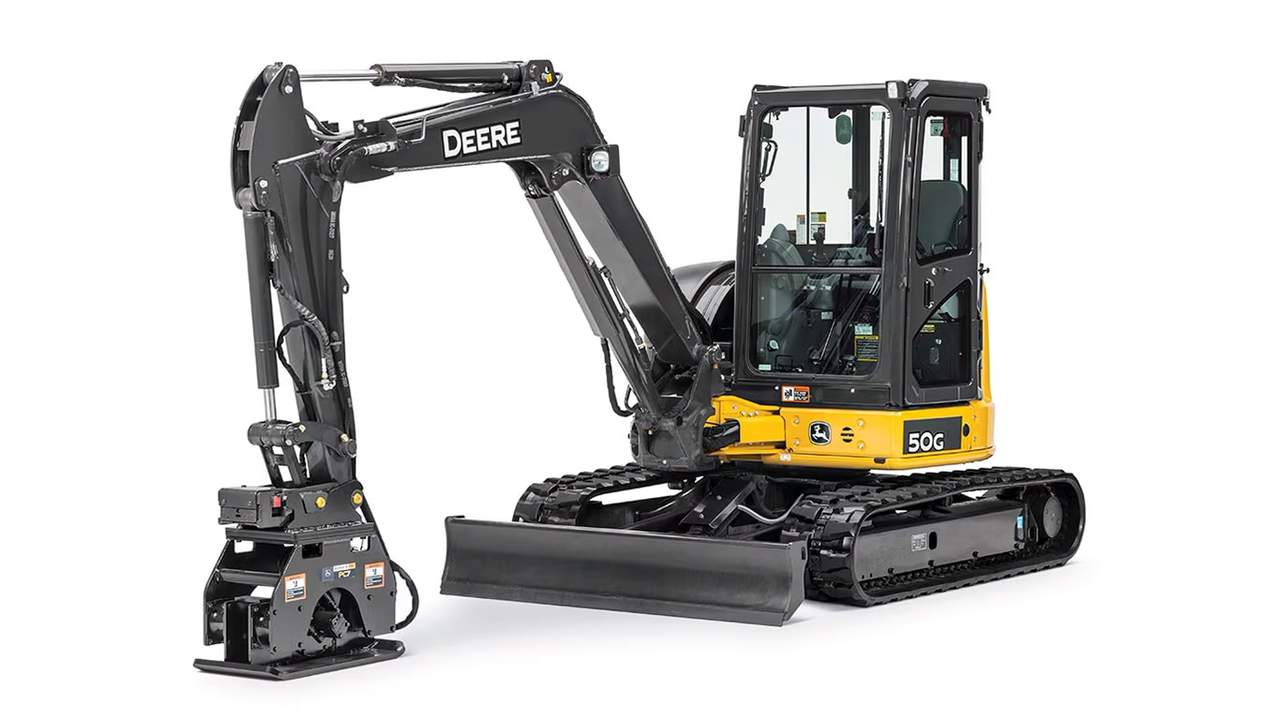 A 50G Compact Excavator with a Plate Compactor attachment
