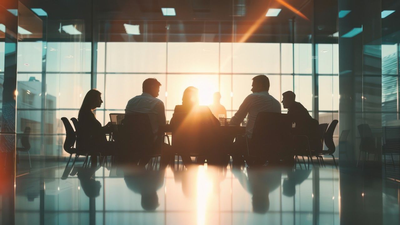 Boardroom leaders discussing evolving ransomware risk.