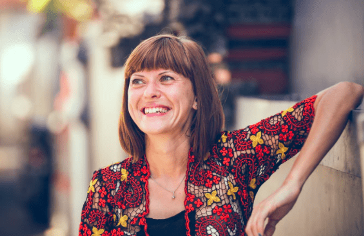Smiling woman cash decreasing