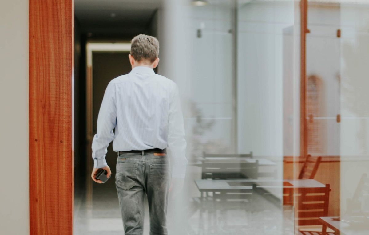 Man leaving building