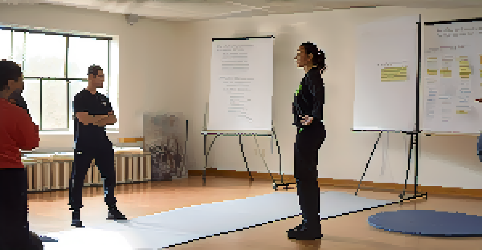 An instructor demonstrating active listening in a self-defense workshop, showing compassion and engagement as a participant speaks, with a flip chart in the background.