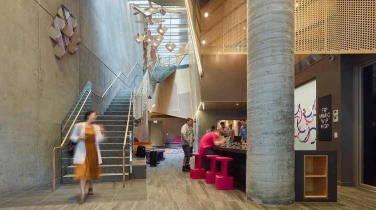 People walking through Student One Wharf St entrance