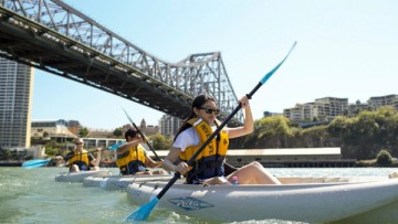 People kayaking on the Brisbane river