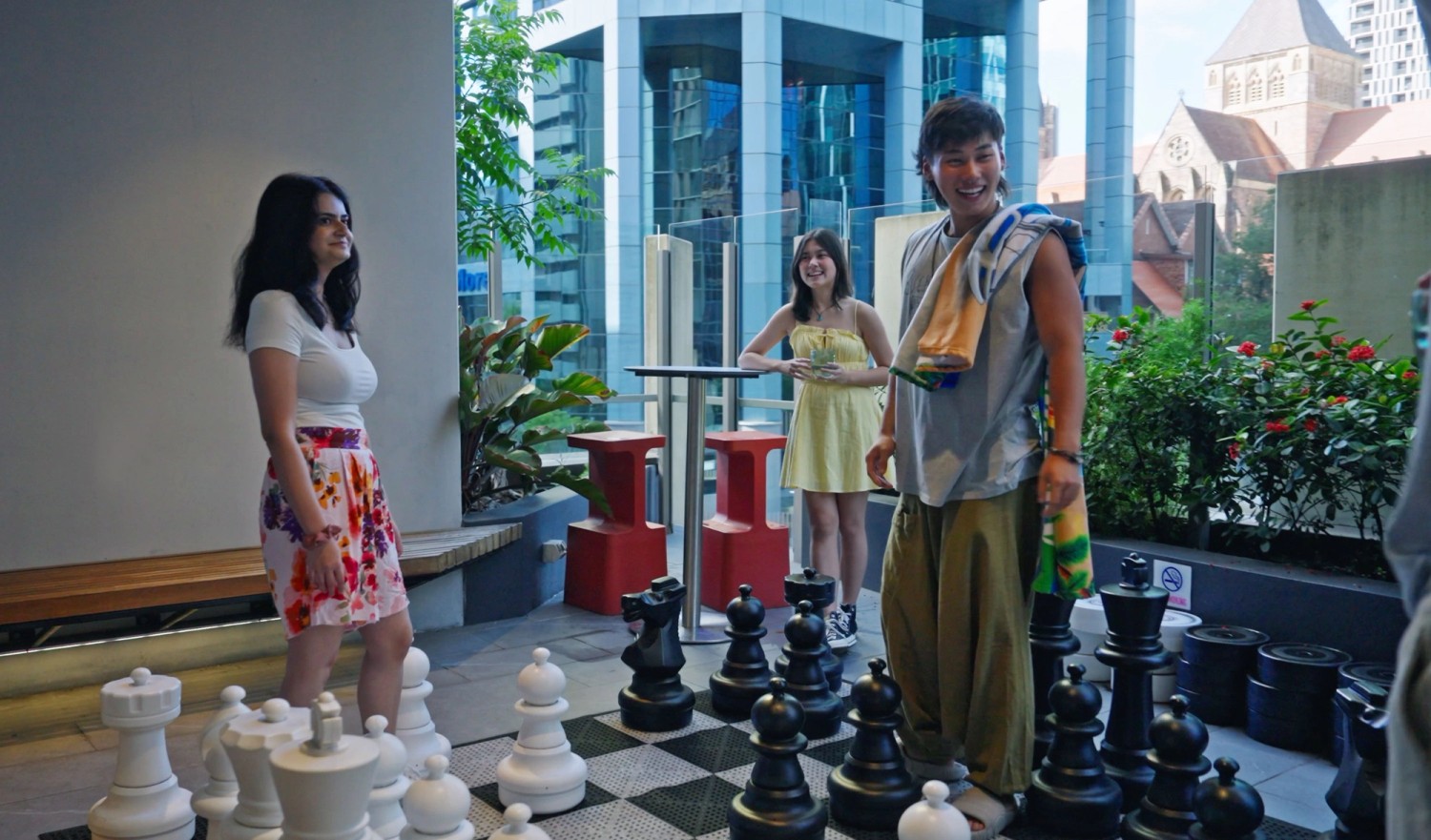 Student One Wharf St games area students playing chess