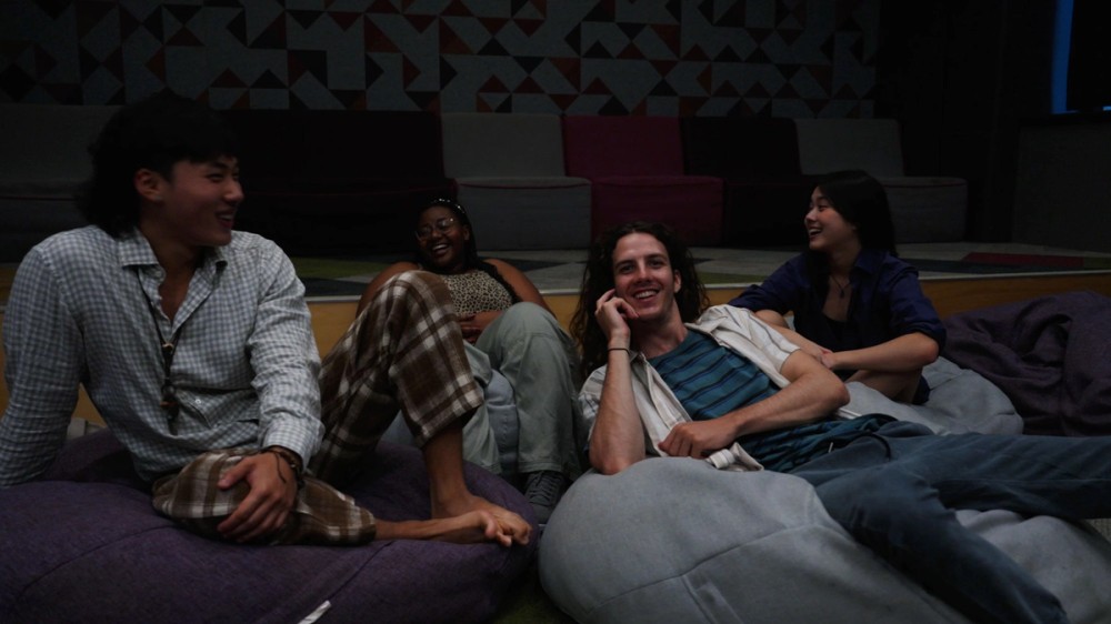 Students sitting in beanbags watching a movie