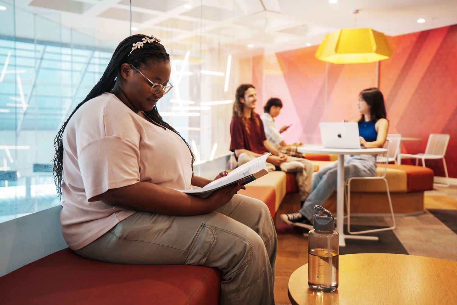 Students walking across the bridge