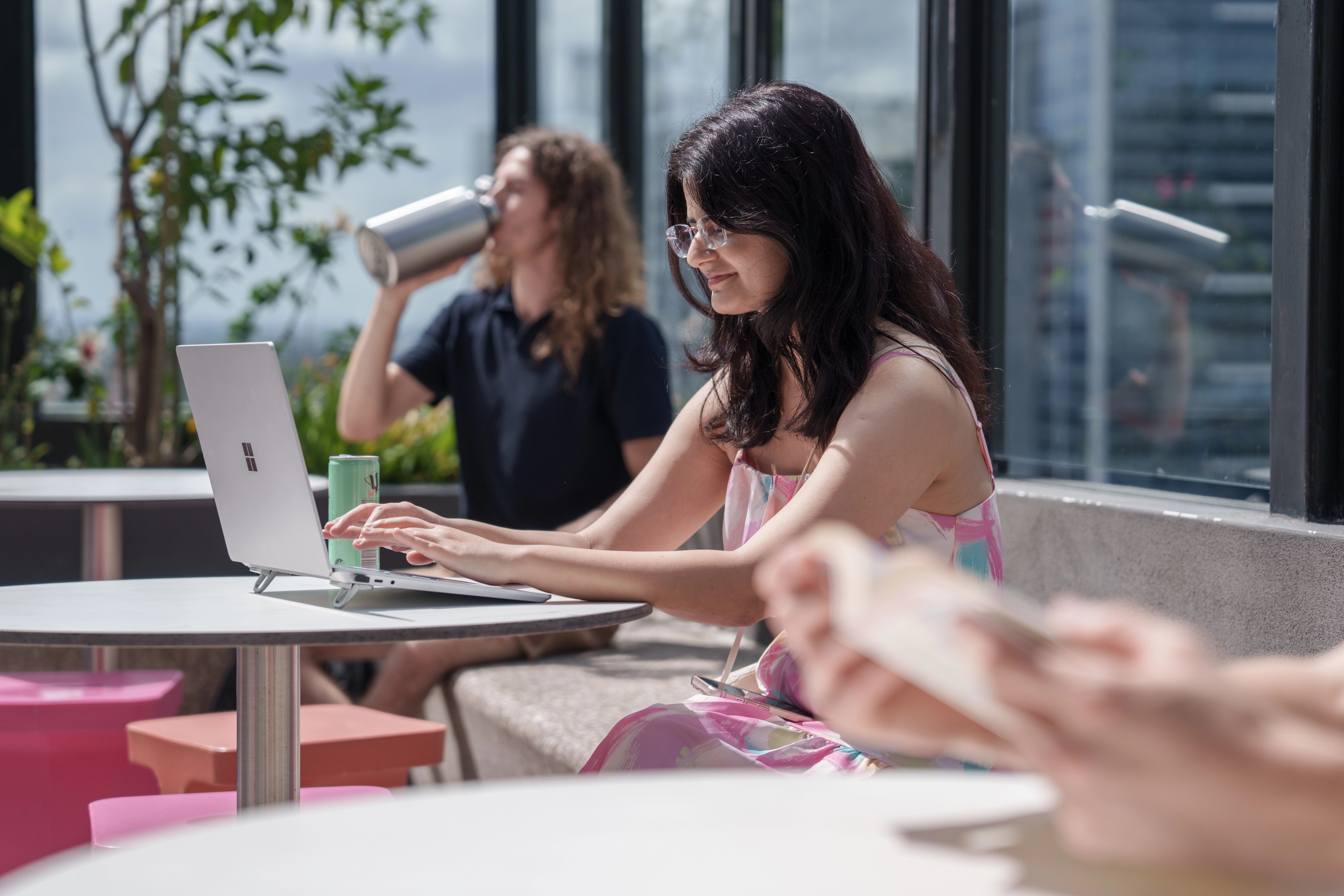 Student studying on Elizabeth St rooftop deck