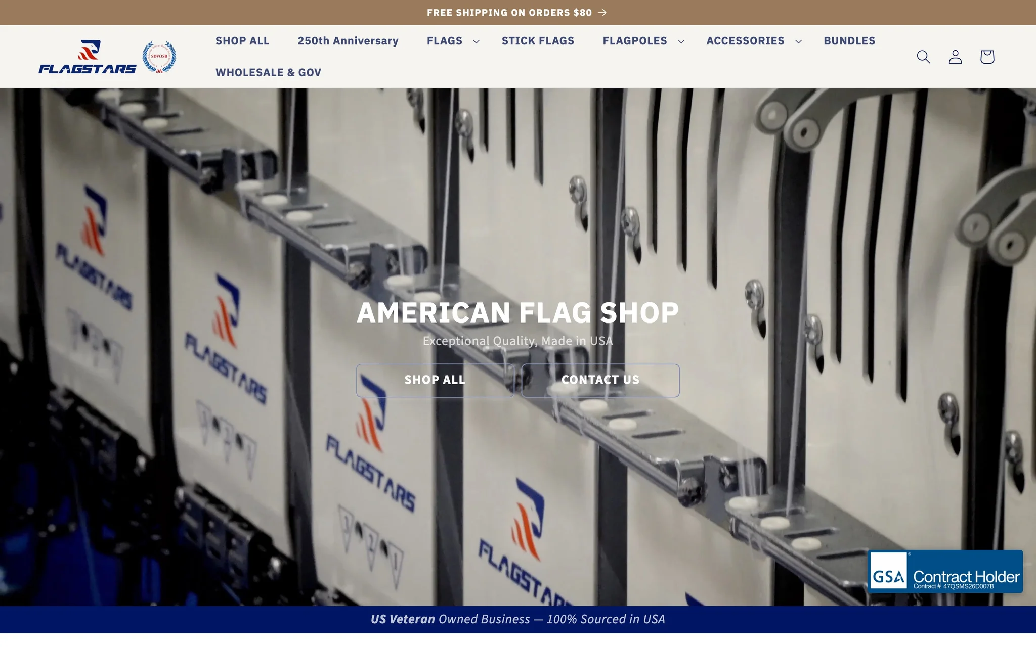 FlagStars homepage hero with the American Flag Shop headline over embroidery-machine footage, a GSA Contract Holder badge and the veteran-owned banner.