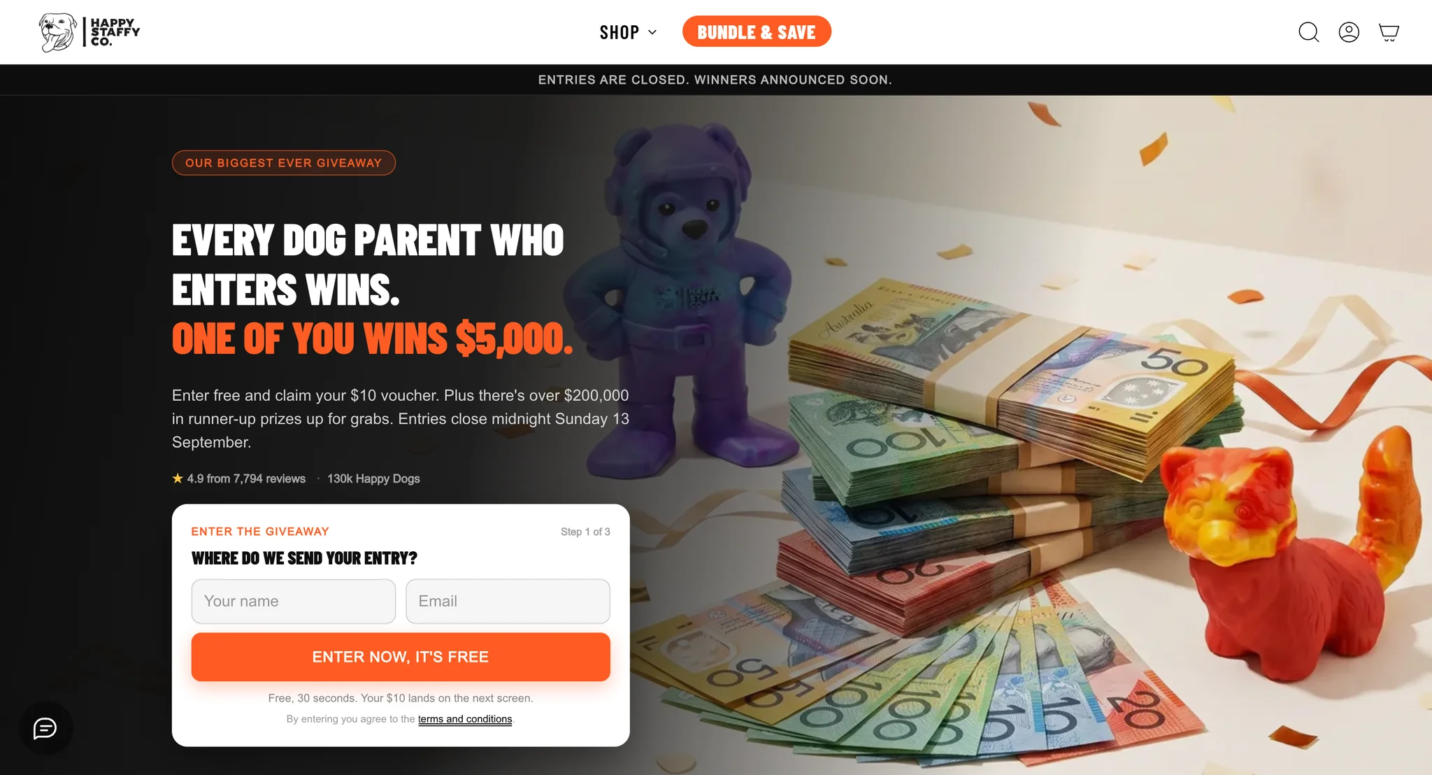 Giveaway page hero with the headline "Every dog parent who enters wins. One of you wins $5,000." beside banknotes and toys, with the entry form below