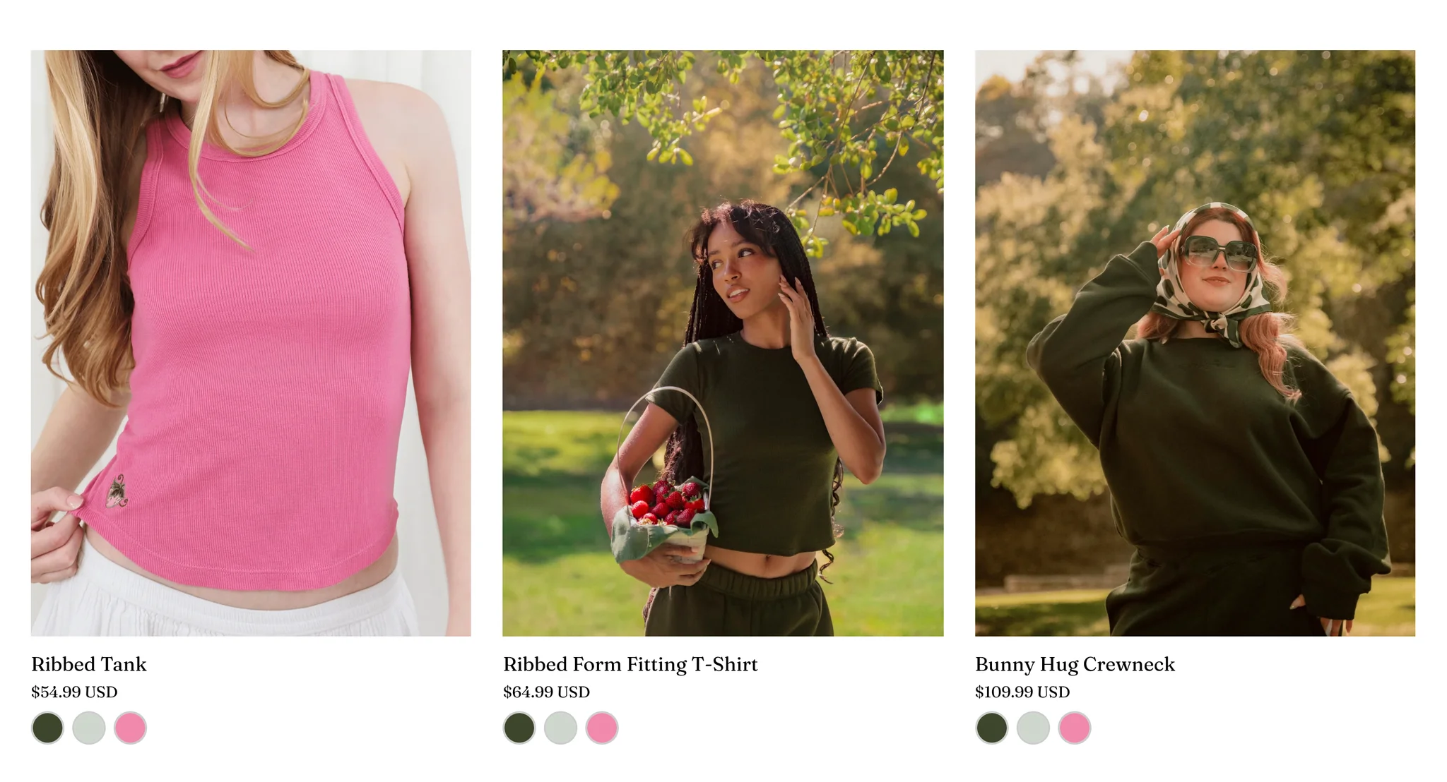 All Products grid with the pink Ribbed Tank at $54.99, the dark green Ribbed Form Fitting T-Shirt with a basket of strawberries at $64.99 and the dark green Bunny Hug Crewneck at $109.99, each with three colour swatches