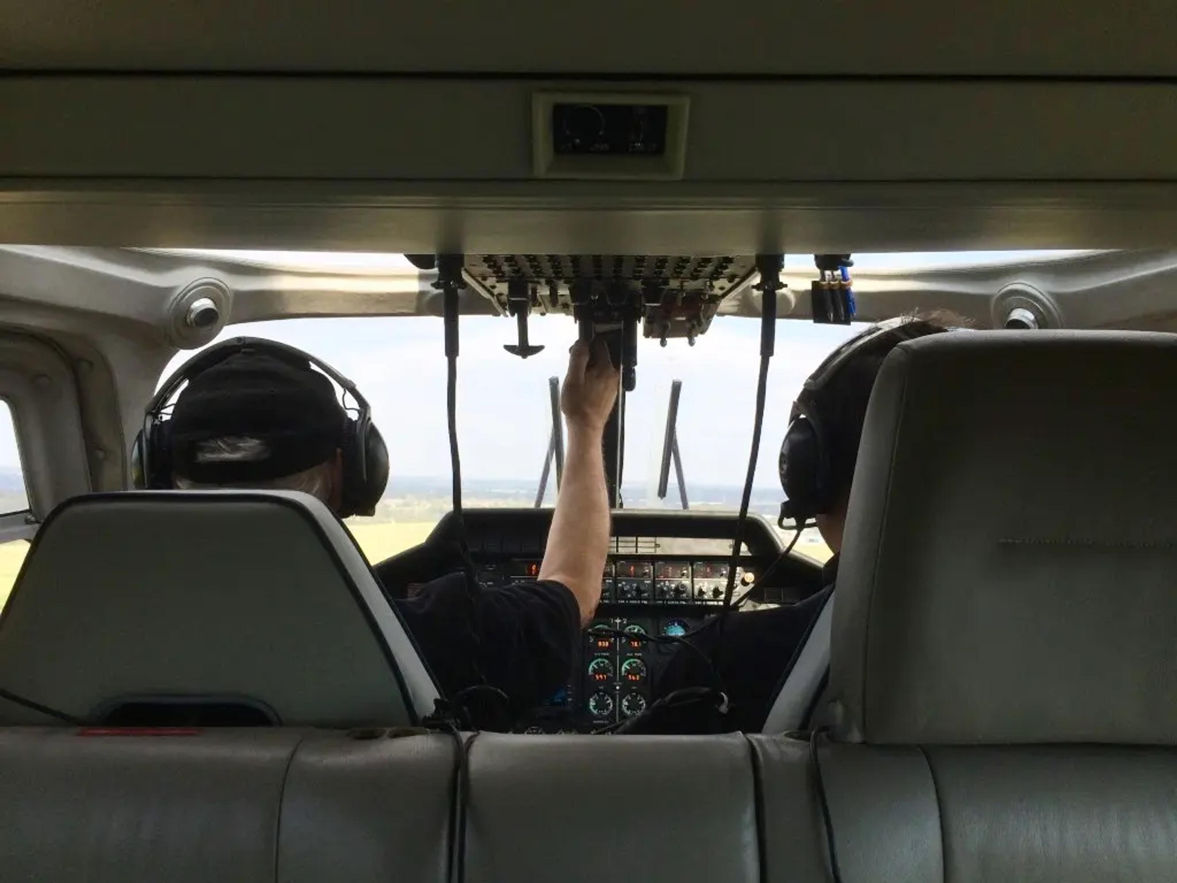 View from the back seat of two pilots flying on instruments