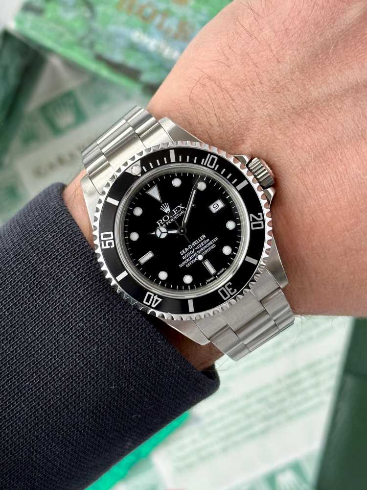 Wrist shot image for Rolex Sea-Dweller 16600 Black 2000 with original box and papers 2