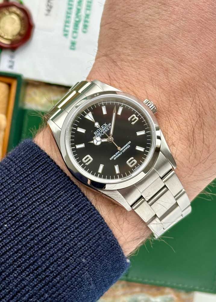 Wrist image for Rolex Explorer 1 "Swiss" 14270 Black 1999 with original box and papers