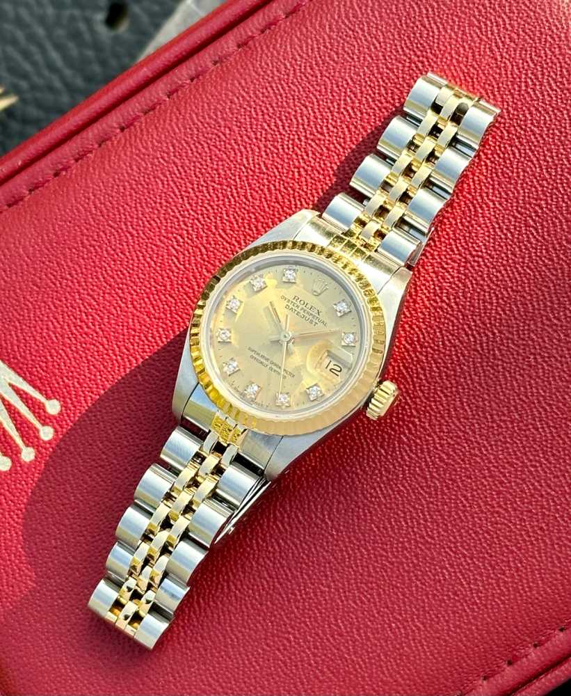 Wrist shot image for Rolex Lady-Datejust "Diamond" 69173G Gold 1990 with original box and papers